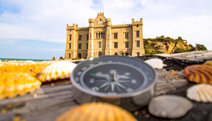 Summer Travel Concept with Old Compass and Beach Themed Objects
