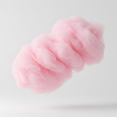 Fluffy pink cotton candy floating gently against a clean white background in soft studio light