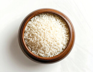 White rice grain in brown ceramic bowl on white background, simple natural food ingredient with soft light