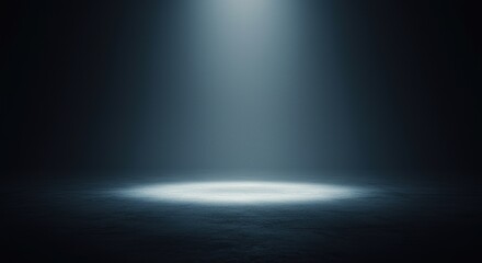 Obraz premium Spotlight beam shining down illuminating dark stage floor backdrop