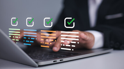 Professional using laptop with digital checklist overlay for business efficiency and project management