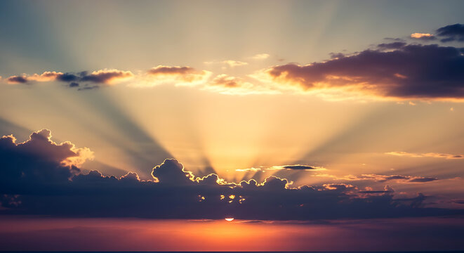Dramatic sunset with sun rays through clouds - Powered by Adobe