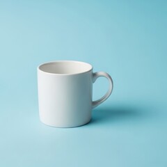 Crisp white ceramic mug on a calming light blue surface showcase