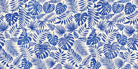 Seamless pattern of blue tropical leaves on a cream background © Lalin