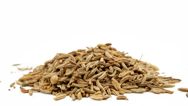 dried caraway seeds isolated on white