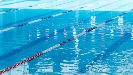 Empty swimming pool with lane dividers for training