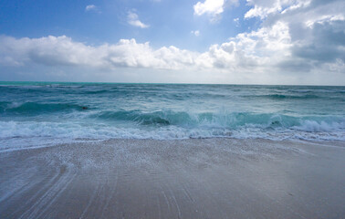Sea wave. Blue ocean waves. Foamy wave. Rolling sea beach waves. Gentle sea beach wave. Summer sea beach.