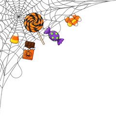 Spooky Halloween treats like candy corn, lollipops, chocolate bars, and wrapped candies scattered...