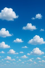 Obraz premium Clear blue sky with fluffy cumulus clouds