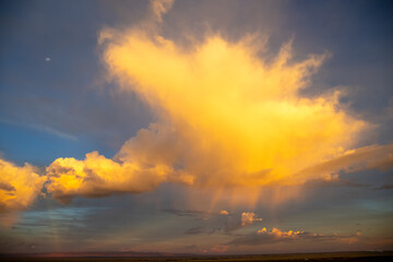 Close up golden cloud after storm in Wyoming