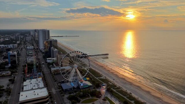 aerial orbit of Myrtle Beach South Carolina at Sunrise in 4k