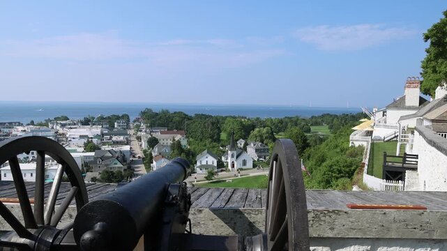 Antique canon overlooking Mackinac Island in Michigan with stable video shot.