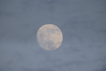 Sept 6 2025 Full Moon with Gentle Clouds in a Soft Sky During Evening Twilight