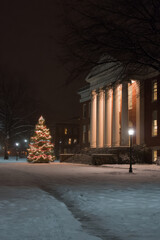 beautiful american university campus adorned with festive holiday lights and majestic christmas tree
