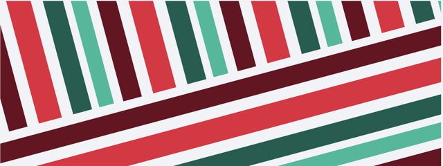 Obraz premium Festive diagonal stripes in classic Christmas colors perfect for holiday designs and decorations.