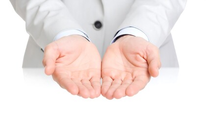 Empty hands, palms up, against white