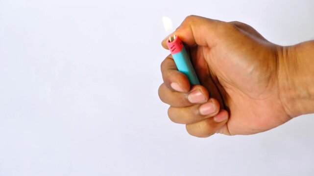 flicking on a lighter to smoke