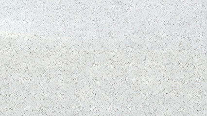 Detailed close up of a seamless white marble texture with tiny speckled granules perfect for elegant and sophisticated designs