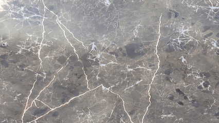 Elegant dark gray marble texture with white veins for sophisticated backgrounds and interior design...