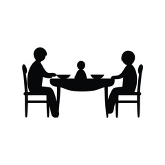 Silhouette of family enjoying a meal together at the dining table