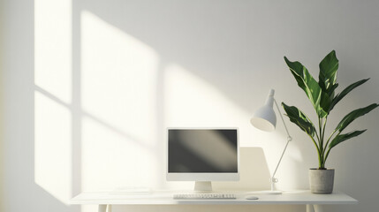 Fototapeta premium Minimalist home office setup with desktop computer and plant. Bright clean workspace with natural light.
