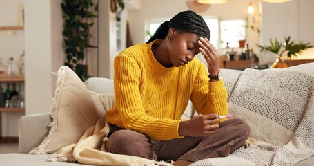 Fototapeta na wymiar Black woman, sofa or anxiety with stress for pregnancy test, doubt or regret in home. Female person, worry or concern with unplanned fertility, mistake or maternity stick for negative result in house