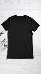 Black t-shirt on white wood