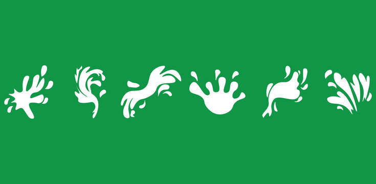Six white milk splatters form abstract artistic pattern on an emerald background