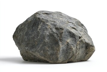 A gray rock sits alone against a white background, showing textures and shadowing on its rugged surface