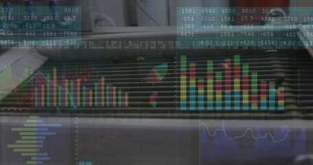 Displaying data visualization overlay on office glass panel with colorful charts, graphs and tables