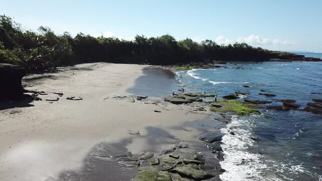 the beauty of Kedungu Beach, Bali during the day