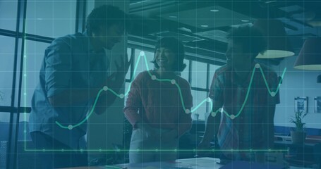 Asian woman and two men analyzing graph overlay at office conference table, printed charts and pens