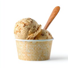 Two scoops of tan ice cream in a patterned paper cup with a small wooden spoon, against a white background