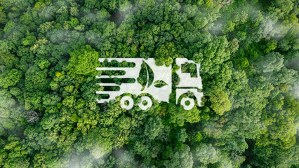 Aerial view of cars in green forest with icons representing eco-friendly transportation. Clean green transportation concept and smart solution for cargo transport.