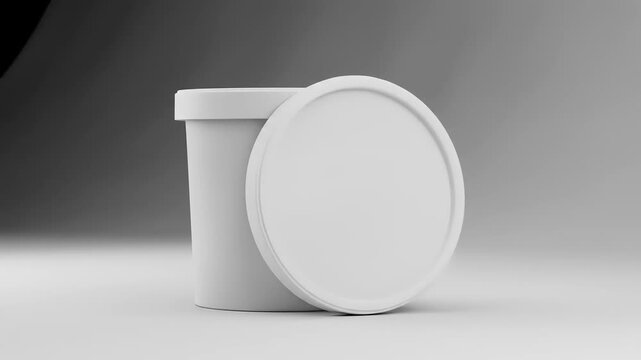 Minimalistic white container with a lid, showcasing its smooth surface and simple design, ideal for packaging