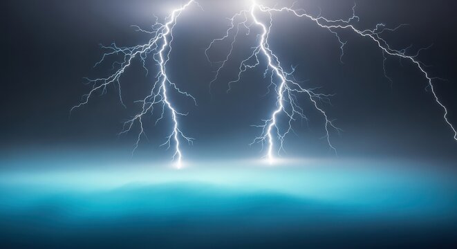 Powerful lightning bolts striking down into a turbulent blue ocean during a dark storm