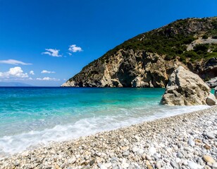 Picturesque beach with turquoise water and rocky shore