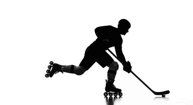 Silhouette of inline hockey player in motion striving for sporting excellence skill and agility on