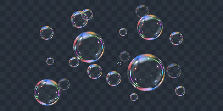 Realistic colorful soap bubbles on transparent background