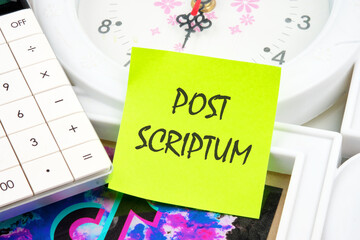 POST SCRIPTUM ancient Latin saying meaning - afterthought, afterwards text on a yellow sticker near...