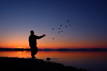 Skipping Stones: Silhouette Man Throwing Stones at Sunset by the Lake