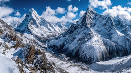 Panoramic view of snow-capped Himalayan peaks under a vibrant sky