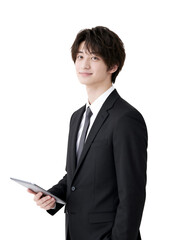 タブレットを持つスーツ姿の若い日本人サラリーマン（透過素材）