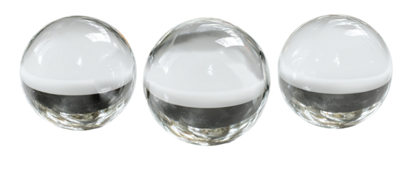 Three clear glass spheres with white interior sections