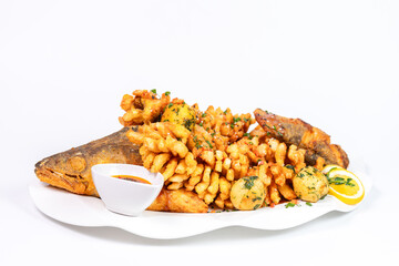 Tasty fried fish served with golden potatoes and creamy sauce on white background, perfect for menu design.