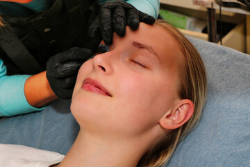 Eyelash care, lamination and coloring in a beauty salon