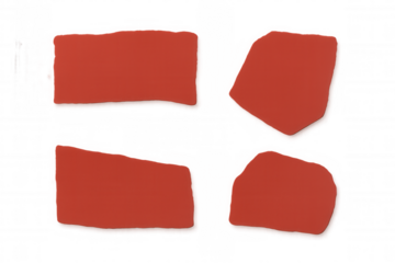 Four torn pieces of red paper arranged on a transparent background, creating an eye-catching abstract composition with a modern flair