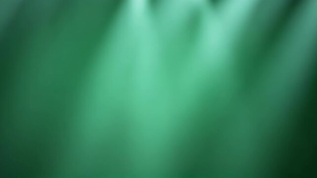 Backgorund of a smooth, dark green gradient background, ideal for adding a touch of nature and sophistication to your projects, creating a calming and elegant atmosphere