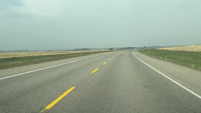 Country Driving With Windshield View of Highway Curve