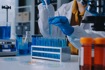 Collaboration, tablet or science with people in lab together for research or development....